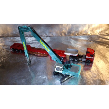 * Herpa Trucks 306140  MB Arocs 6x4 low-boy semitrailer with Liebherr crawler excavator 954 longfront "Colonia / Harzheim"