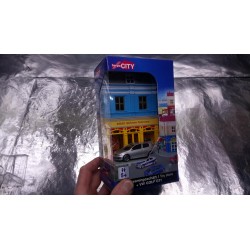 * Herpa City  800020 Toy store with VW Golf GTI die-cast model